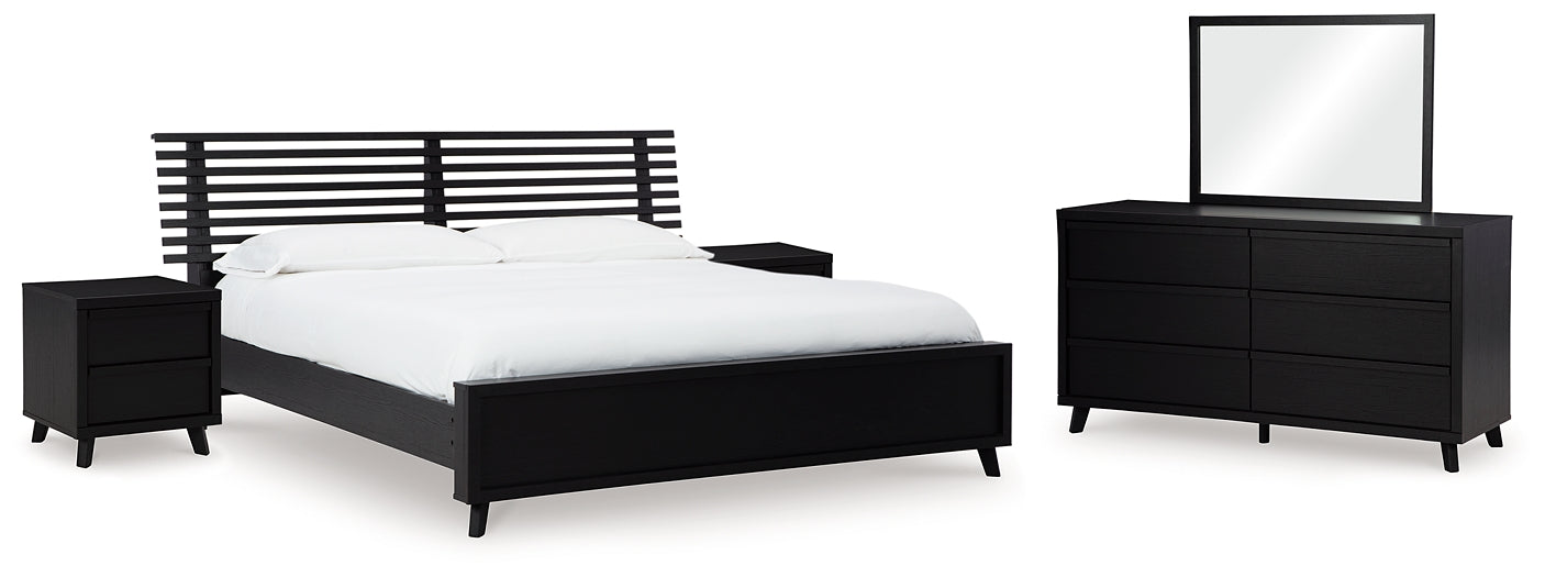 Danziar Queen Panel Bed with Mirrored Dresser and 2 Nightstands