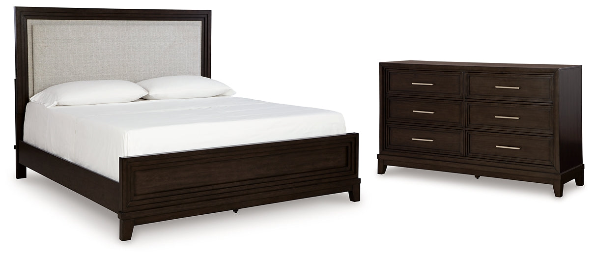 Neymorton California King Upholstered Panel Bed with Dresser