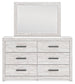 Cayboni King Panel Bed with Mirrored Dresser, Chest and 2 Nightstands