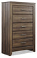 Juararo King Panel Bed with Mirrored Dresser, Chest and 2 Nightstands